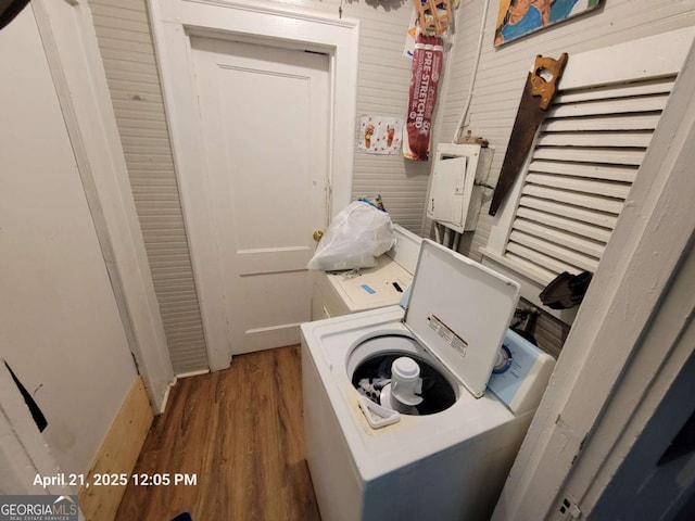 1336 Winton Ave, Macon, GA 31204 - laundry area with washer / dryer and wood finished floors