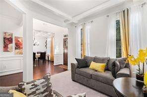 121 Royal Sunset Dr, Dallas, GA 30157 - living room with ornamental molding, beamed ceiling, and coffered ceiling