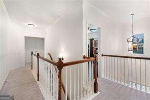 121 Royal Sunset Dr, Dallas, GA 30157 - corridor with an upstairs landing and carpet floors