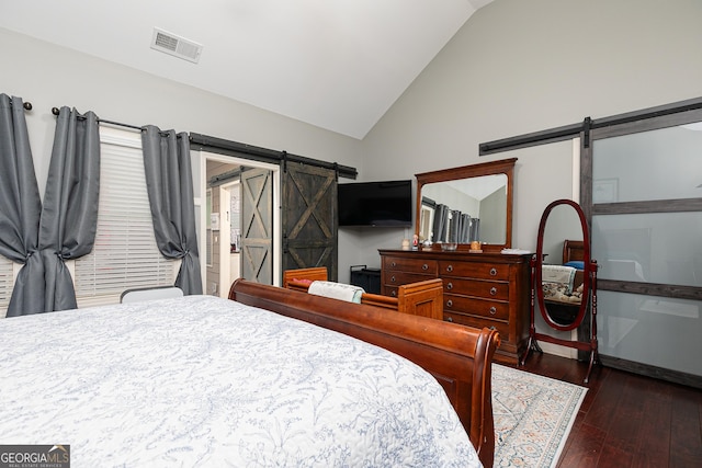 2256 Long Bow Chase NW, Kennesaw, GA 30144 - bedroom with a barn door, hardwood / wood-style floors, and high vaulted ceiling