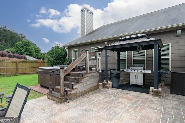 2256 Long Bow Chase NW, Kennesaw, GA 30144 - view of patio with a hot tub, a gazebo, and grilling area