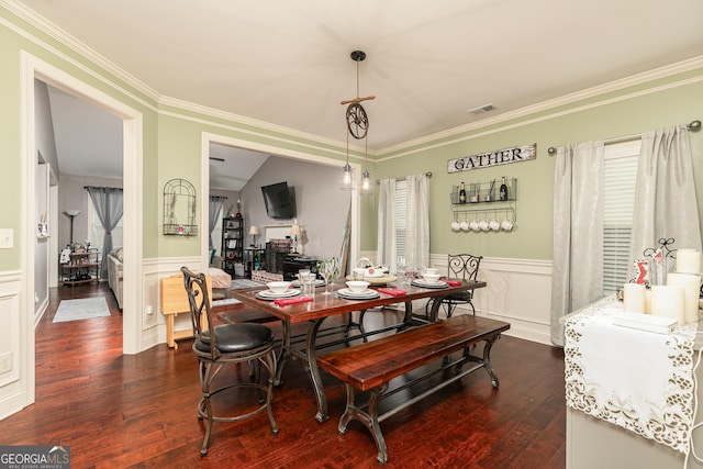 2256 Long Bow Chase NW, Kennesaw, GA 30144 - dining area with ornamental molding, dark wood finished floors, and wainscoting