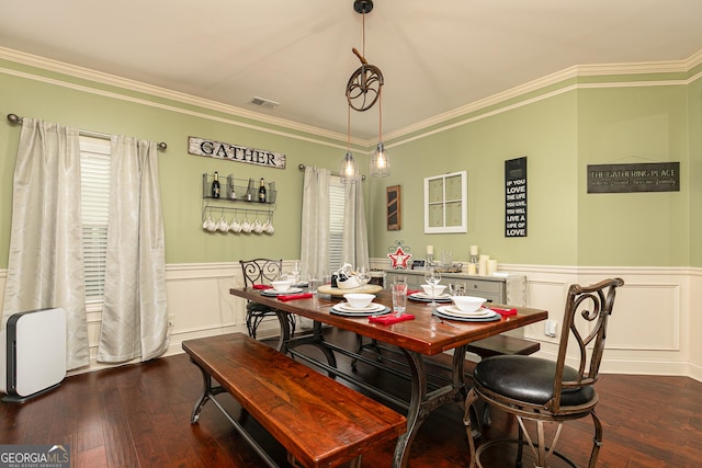 2256 Long Bow Chase NW, Kennesaw, GA 30144 - dining room with dark wood finished floors, a wainscoted wall, ornamental molding, and a decorative wall