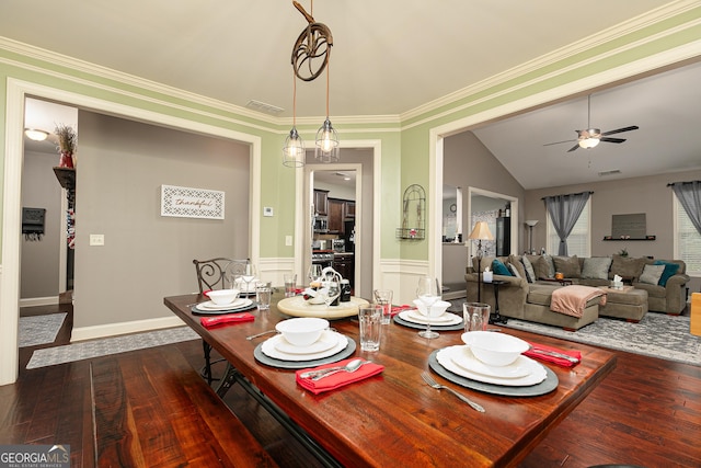 2256 Long Bow Chase NW, Kennesaw, GA 30144 - dining room featuring ceiling fan, dark wood-style floors, wainscoting, lofted ceiling, and crown molding