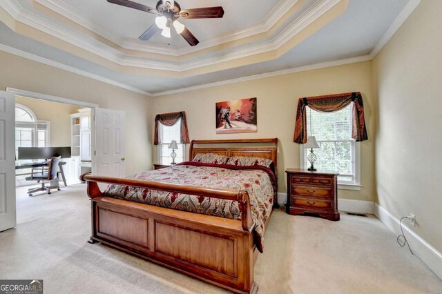 5980 Whitestone Ln, Suwanee, GA 30024 - bedroom featuring light colored carpet, a raised ceiling, crown molding, and ceiling fan