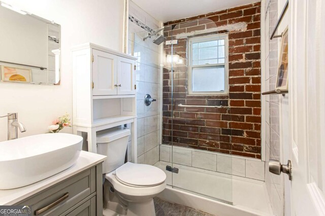 40 Daniel St SE, Atlanta, GA 30312 - bathroom featuring a shower stall, vanity, and toilet
