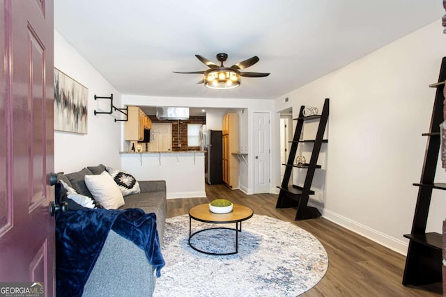 40 Daniel St SE, Atlanta, GA 30312 - living room with ceiling fan, dark wood finished floors, and baseboards