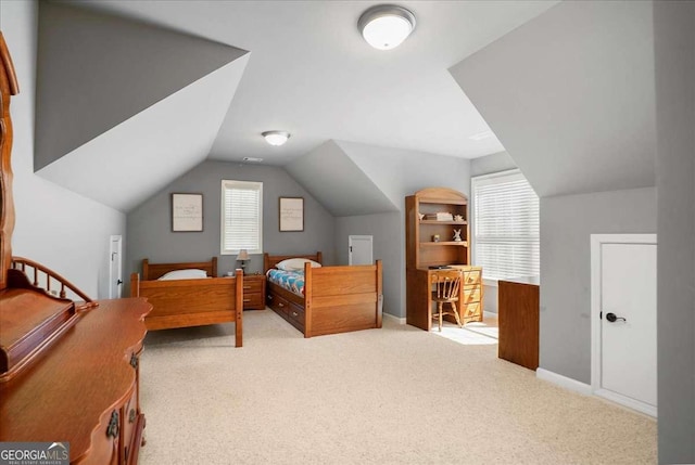1917 Hearthstone Ct, Winder, GA 30680 - bedroom with carpet floors and vaulted ceiling