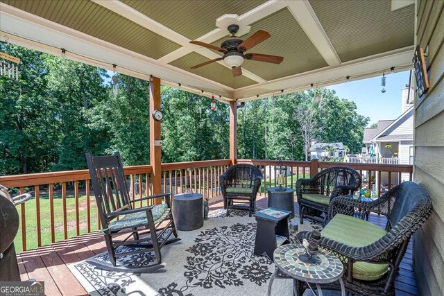 1917 Hearthstone Ct, Winder, GA 30680 - deck featuring an outdoor fire pit and ceiling fan