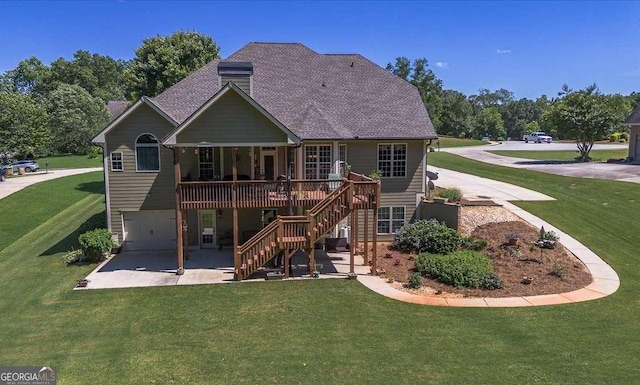 1917 Hearthstone Ct, Winder, GA 30680 - back of property featuring a patio area, stairway, a wooden deck, and a yard