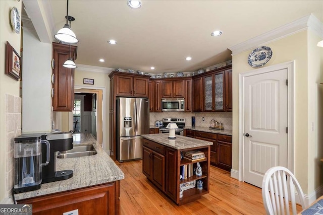 1917 Hearthstone Ct, Winder, GA 30680 - kitchen with appliances with stainless steel finishes, ornamental molding, open shelves, recessed lighting, and tasteful backsplash