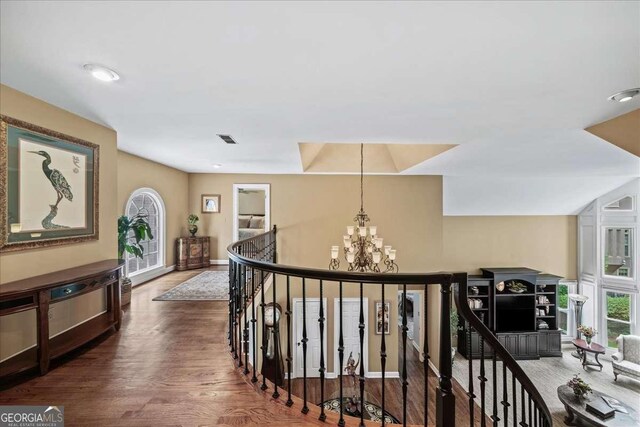 162 Daltree Ct, Marietta, GA 30068 - corridor featuring an upstairs landing, a chandelier, and wood finished floors