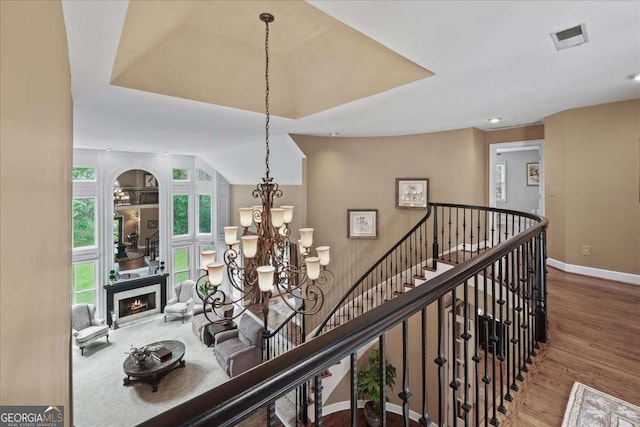 162 Daltree Ct, Marietta, GA 30068 - hall featuring wood finished floors, a chandelier, an upstairs landing, and recessed lighting