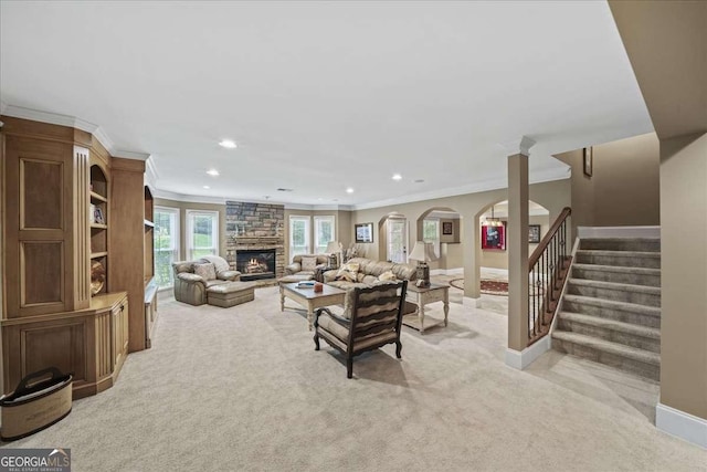 162 Daltree Ct, Marietta, GA 30068 - living area with light colored carpet, ornamental molding, recessed lighting, stairway, and a fireplace