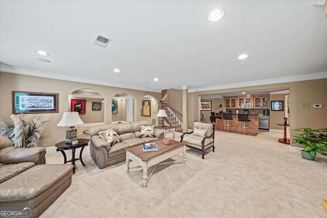 162 Daltree Ct, Marietta, GA 30068 - living area featuring crown molding, light carpet, bar, recessed lighting, and stairway