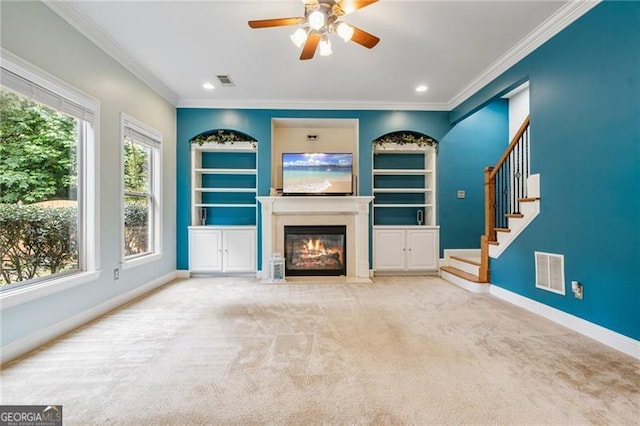 1210 Magnolia Park Cir, Cumming, GA 30040 - unfurnished living room with a fireplace with flush hearth, baseboards, ceiling fan, ornamental molding, and built in features