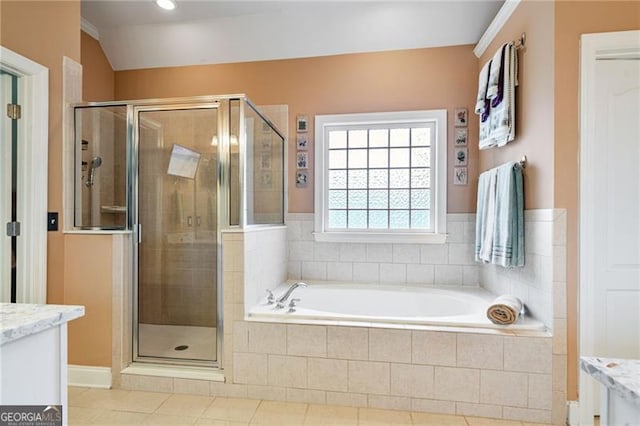 1210 Magnolia Park Cir, Cumming, GA 30040 - bathroom with vanity, a bath, a shower stall, and tile patterned floors