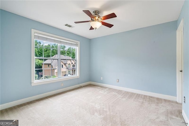 1210 Magnolia Park Cir, Cumming, GA 30040 - spare room featuring carpet flooring and ceiling fan