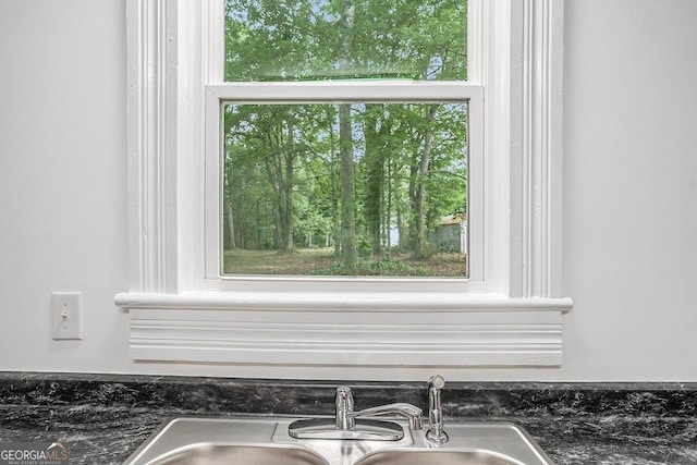 1852 Burwell Rd, Carrollton, GA 30117 - kitchen view of dark countertops and a sink