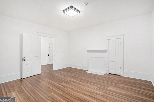 1852 Burwell Rd, Carrollton, GA 30117 - empty room with wood finished floors and baseboards