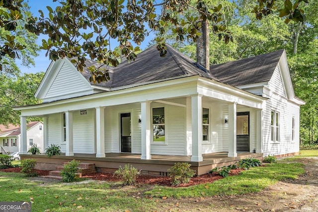 1852 Burwell Rd, Carrollton, GA 30117 - view of front of home featuring a porch and a shingled roof