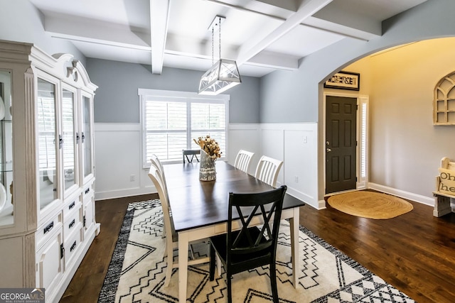 101 High Bluff Trl, Carrollton, GA 30116 - dining room with arched walkways, wood finished floors, wainscoting, coffered ceiling, and beam ceiling
