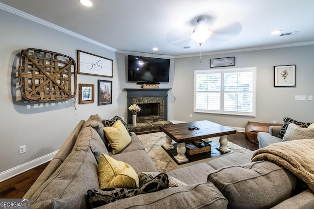 101 High Bluff Trl, Carrollton, GA 30116 - living room with ceiling fan, baseboards, wood finished floors, ornamental molding, and a brick fireplace