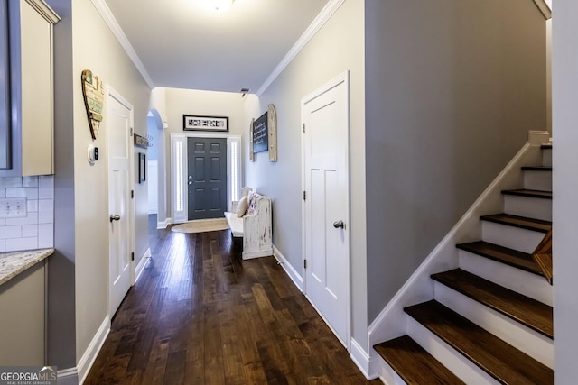 101 High Bluff Trl, Carrollton, GA 30116 - hallway featuring ornamental molding, dark wood finished floors, stairway, and baseboards