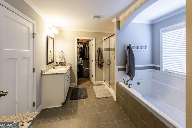 101 High Bluff Trl, Carrollton, GA 30116 - full bathroom featuring vanity, a shower stall, a whirlpool tub, tile patterned floors, and crown molding