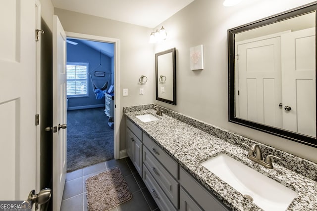 101 High Bluff Trl, Carrollton, GA 30116 - bathroom featuring double vanity, baseboards, and tile patterned floors