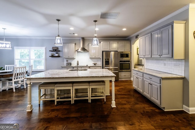 101 High Bluff Trl, Carrollton, GA 30116 - kitchen with appliances with stainless steel finishes, a sink, ornamental molding, a breakfast bar area, and tasteful backsplash