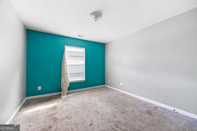 6770 Gordon Manor Ct SW, Mableton, GA 30126 - carpeted spare room featuring baseboards