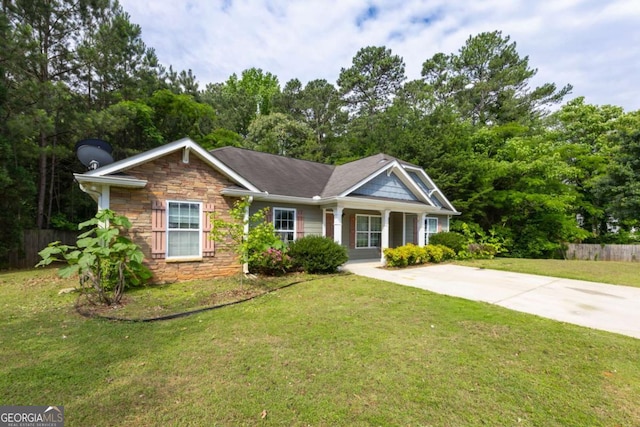6770 Gordon Manor Ct SW, Mableton, GA 30126 - view of front of home featuring stone siding and a porch
