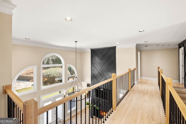 410 S Burgess Trl, Milton, GA 30004 - hall with an upstairs landing, recessed lighting, light wood-style floors, baseboards, and crown molding