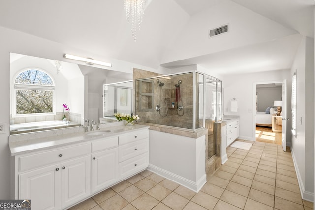 410 S Burgess Trl, Milton, GA 30004 - bathroom featuring tile patterned flooring, vanity, a shower stall, ensuite bath, and lofted ceiling