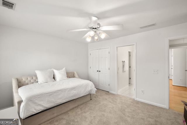 410 S Burgess Trl, Milton, GA 30004 - bedroom featuring carpet, a closet, baseboards, and a ceiling fan