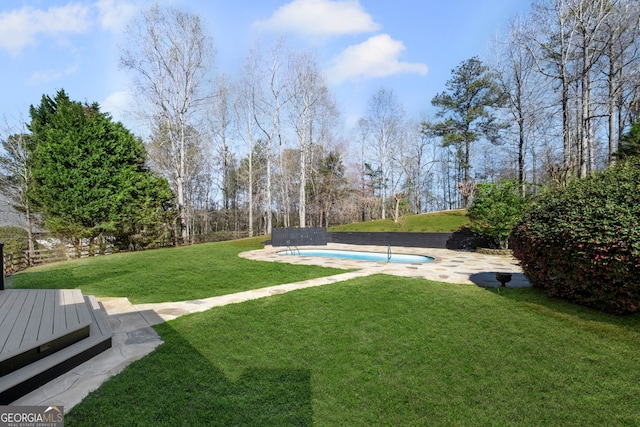 410 S Burgess Trl, Milton, GA 30004 - view of grassy yard with an outdoor pool