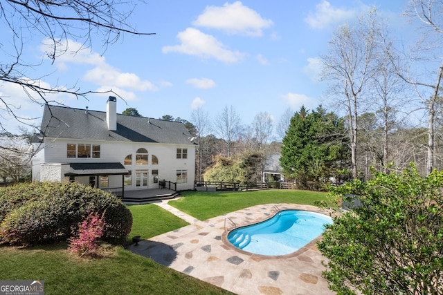 410 S Burgess Trl, Milton, GA 30004 - back of house featuring a patio area, a chimney, and an outdoor pool