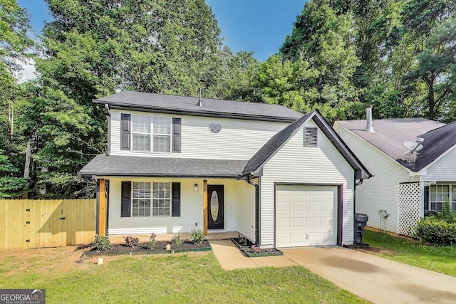 131 Turning Pt, Stockbridge, GA 30281 - traditional home with a garage, driveway, and roof with shingles