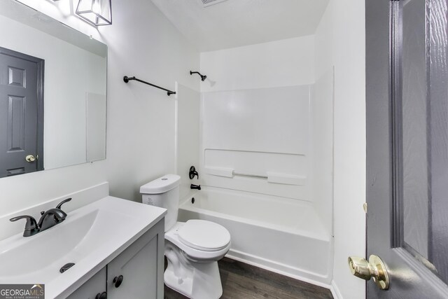 131 Turning Pt, Stockbridge, GA 30281 - bathroom with vanity, wood finished floors, and shower / washtub combination