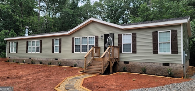 4373 Whiporwill Rd, Gillsville, GA 30543 - manufactured / mobile home featuring crawl space and view of wooded area