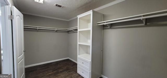 4373 Whiporwill Rd, Gillsville, GA 30543 - walk in closet with dark wood-style floors