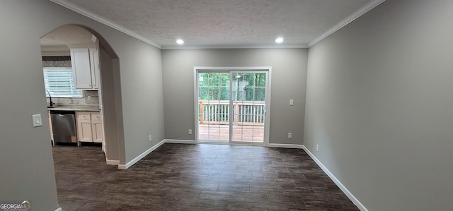 4373 Whiporwill Rd, Gillsville, GA 30543 - unfurnished dining area with arched walkways, dark wood finished floors, baseboards, recessed lighting, and a textured ceiling