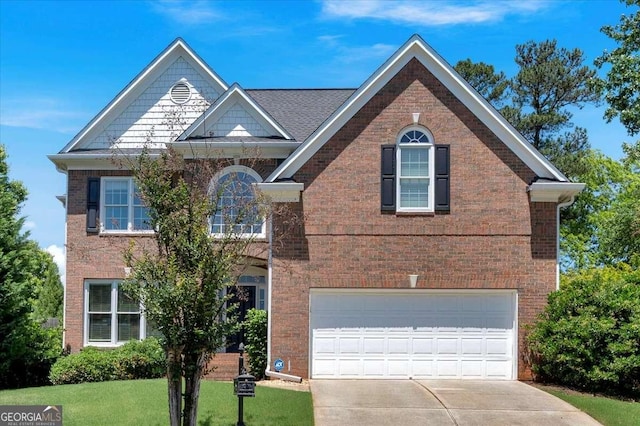 3400 Dencrest Ct SE, Smyrna, GA 30080 - view of front facade featuring an attached garage, brick siding, driveway, and a front yard