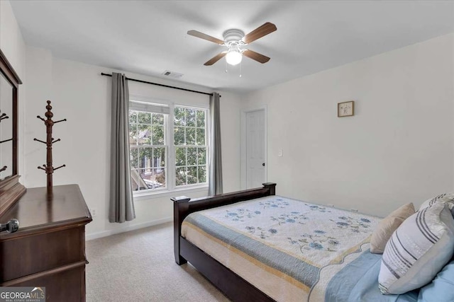 3400 Dencrest Ct SE, Smyrna, GA 30080 - bedroom with light carpet, baseboards, and ceiling fan