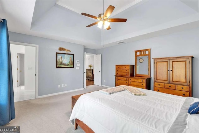 3400 Dencrest Ct SE, Smyrna, GA 30080 - bedroom with a raised ceiling, light carpet, baseboards, and a ceiling fan