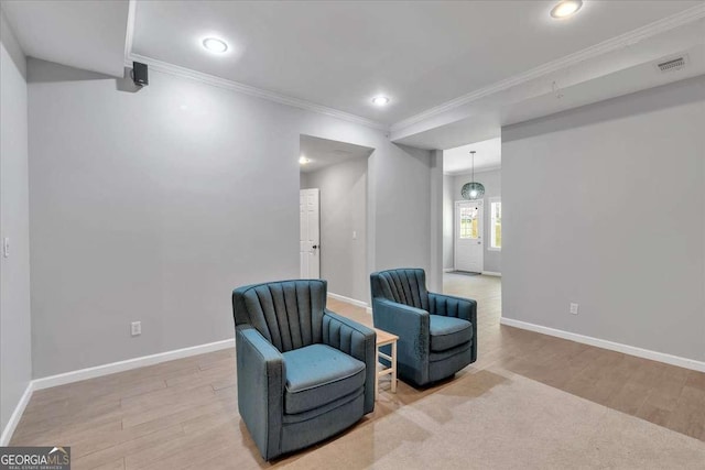 3400 Dencrest Ct SE, Smyrna, GA 30080 - sitting room featuring crown molding, light wood-style floors, baseboards, and recessed lighting
