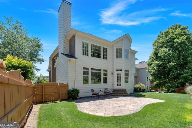 3400 Dencrest Ct SE, Smyrna, GA 30080 - back of property featuring a chimney, a patio area, and entry steps