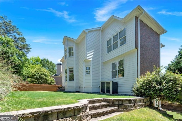 3400 Dencrest Ct SE, Smyrna, GA 30080 - back of house with a lawn