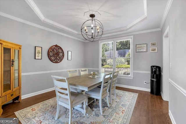 3400 Dencrest Ct SE, Smyrna, GA 30080 - dining area with a chandelier, dark wood-type flooring, ornamental molding, a tray ceiling, and baseboards